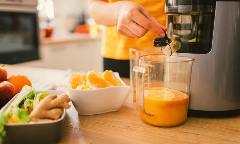 extracting juice from a cold press juicer