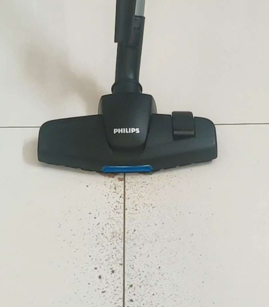 Cleaning sand from hard floor for tests to find best vacuum cleaner for home in India